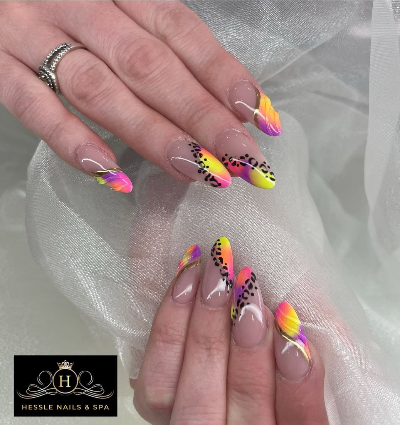 Neon ombre nail art with leopard print and gold linework